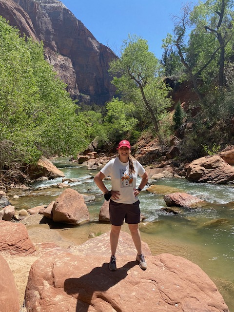 Main Page Photo Shubin Shubin standing on a rock near the Zion river in Zion National Park, a scenic outdoor setting with greenery and cliffs in the background.
Epic!